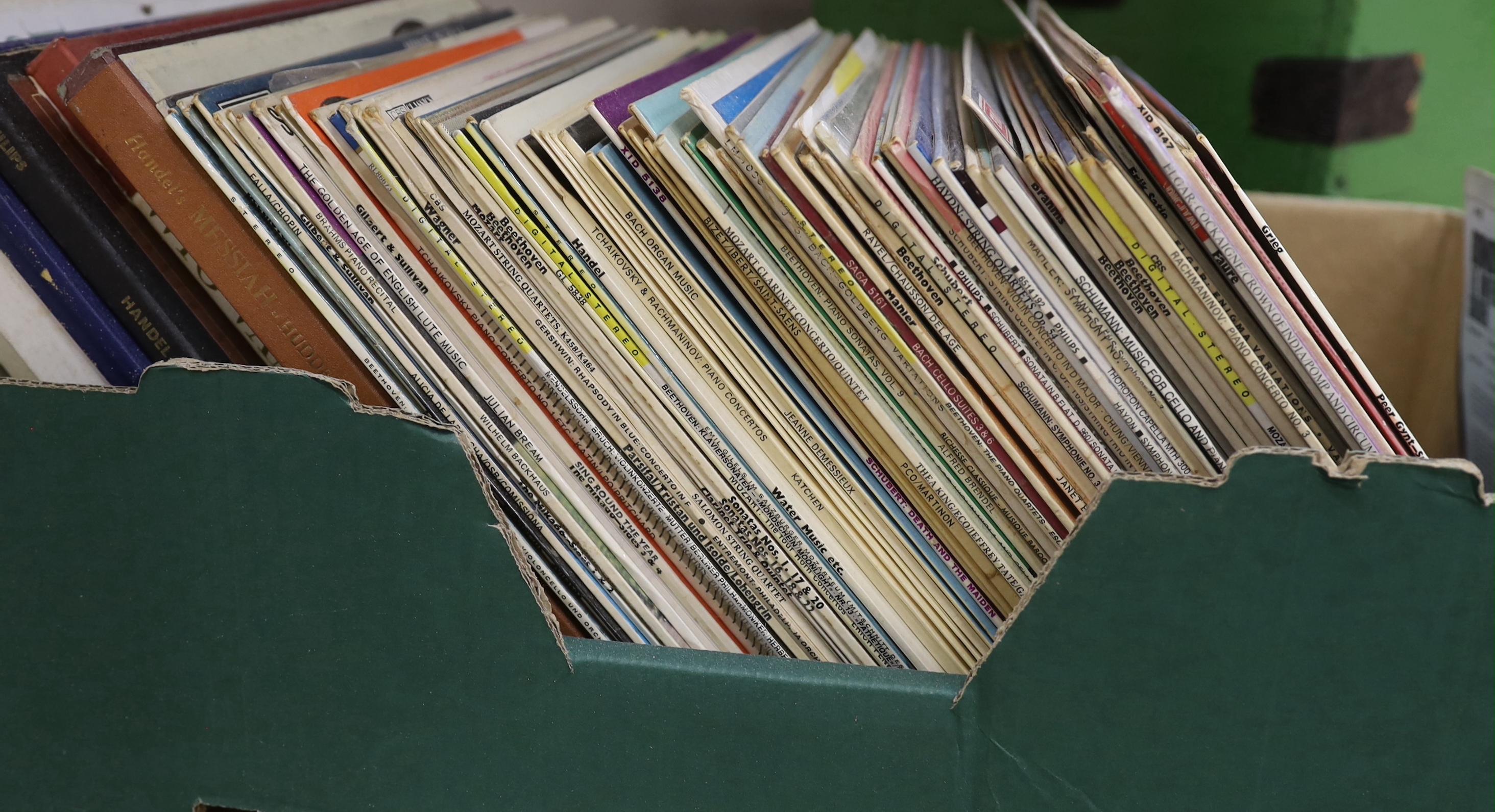 A large collection of jazz, classical and pop record albums and a green painted pine box